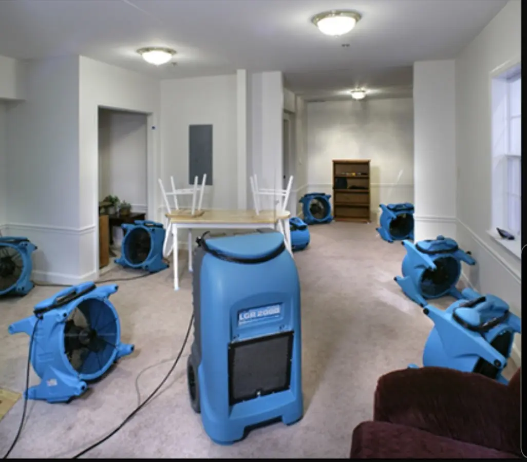 Air movers and dehumidifier setup for Water Damage Restoration in Moultonborough